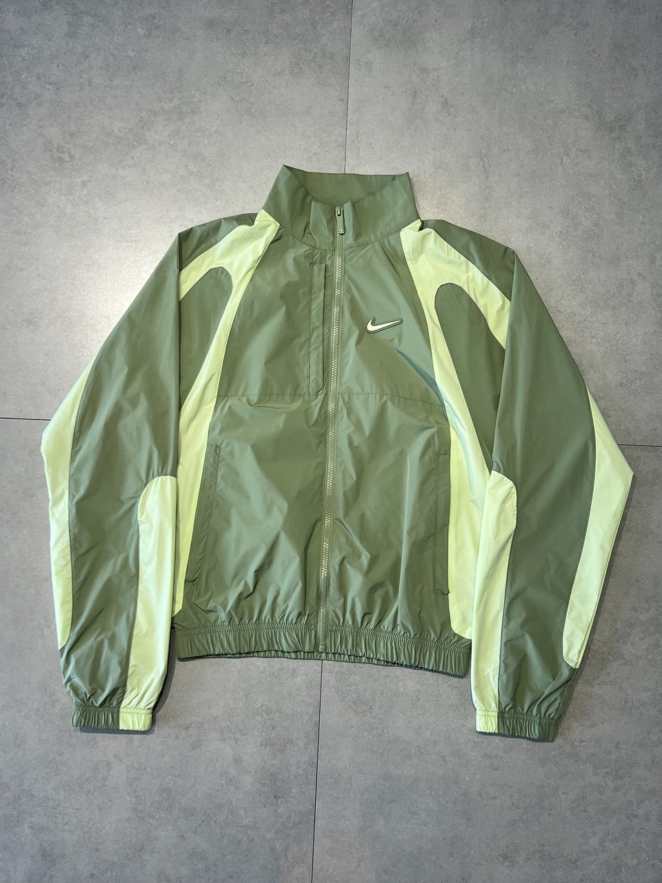 CORTA VENTO NIKE x NOCTA TRACK