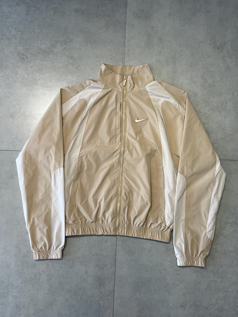 CORTA VENTO NIKE x NOCTA TRACK