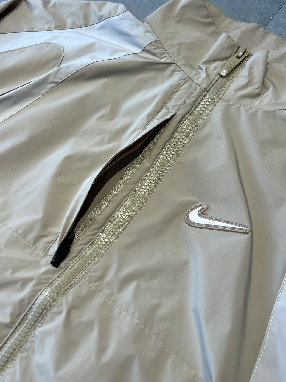 CORTA VENTO NIKE x NOCTA TRACK