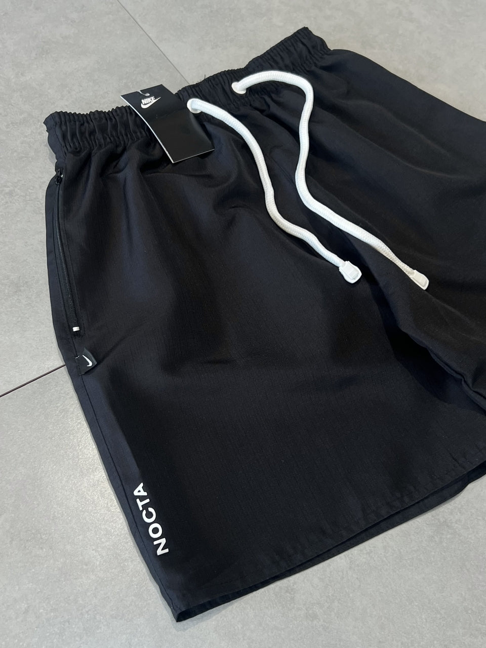 BERMUDA NIKE x NOCTA