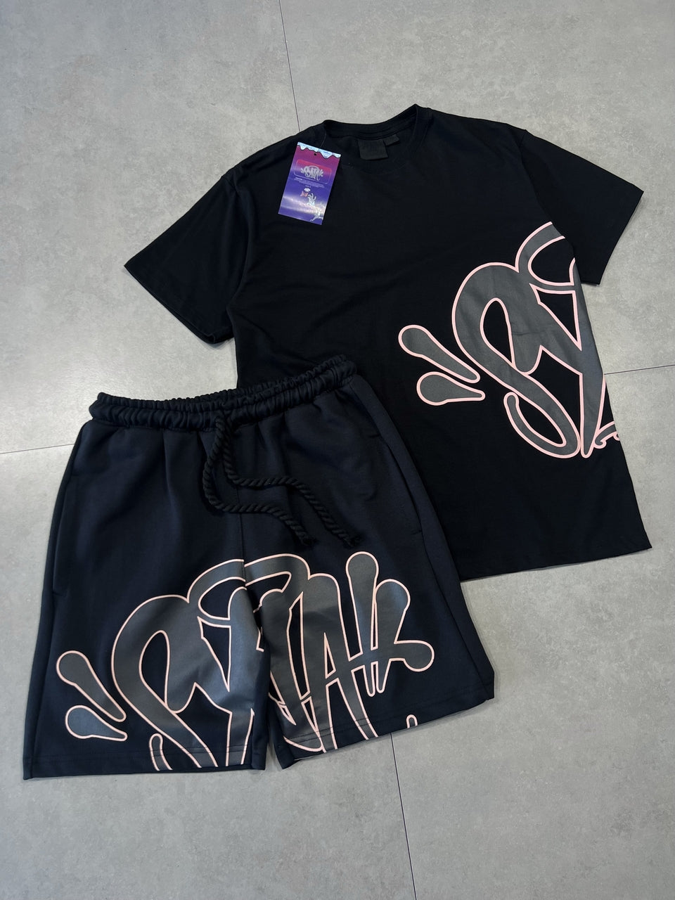 CONJUNTO SYNA WORLD LOGO