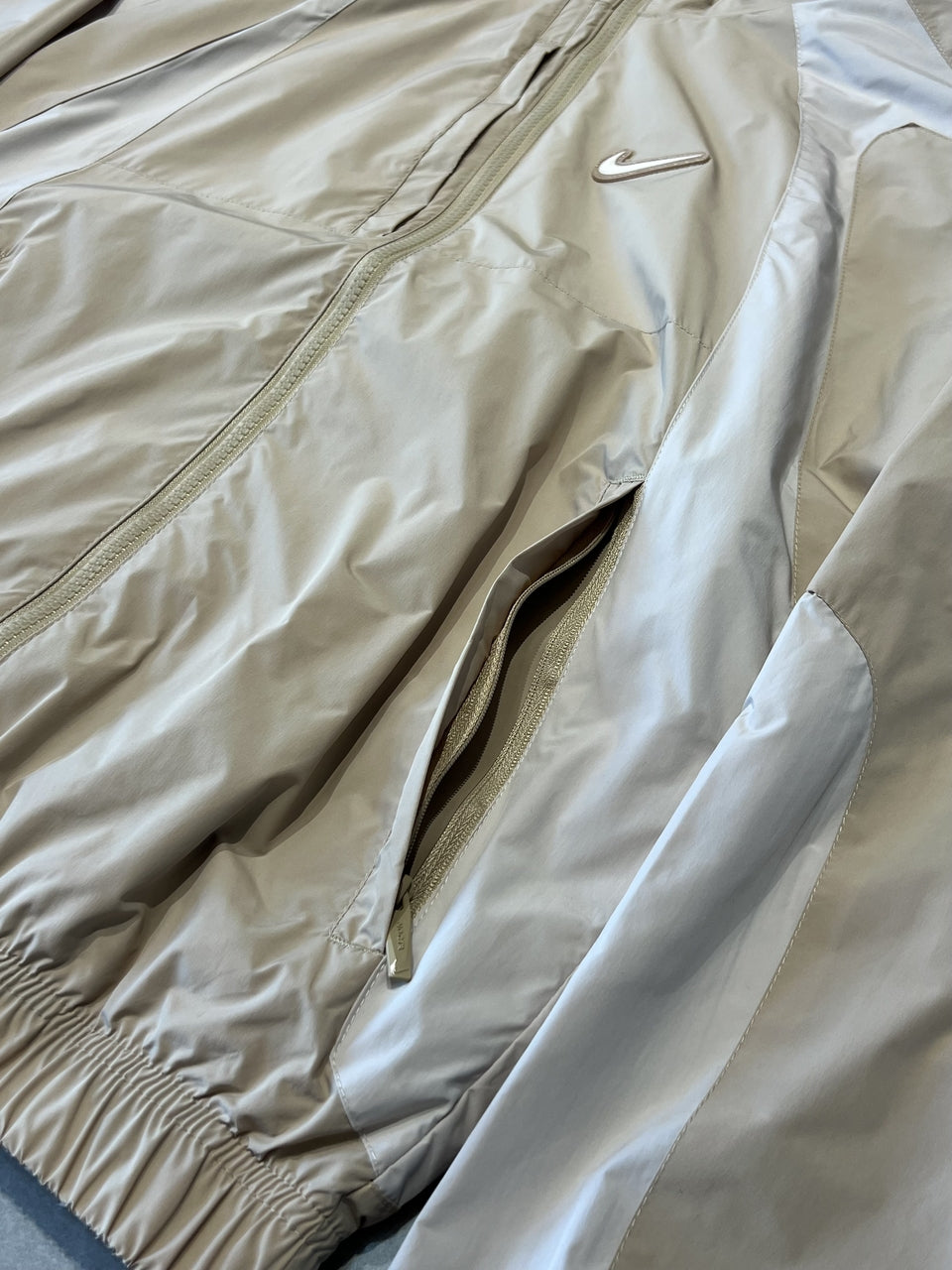 CORTA VENTO NIKE x NOCTA TRACK