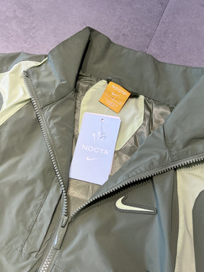 CORTA VENTO NIKE x NOCTA TRACK