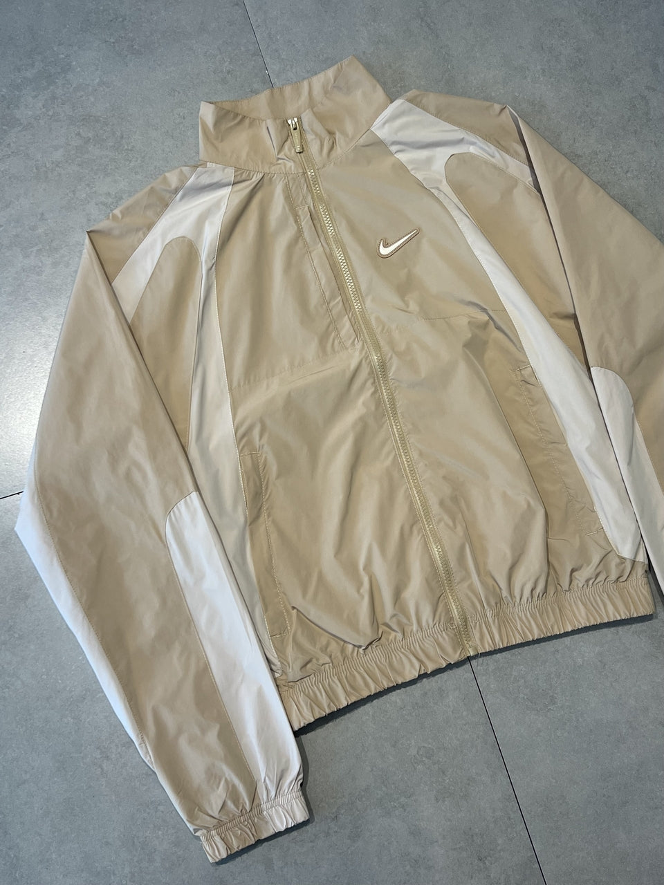 CORTA VENTO NIKE x NOCTA TRACK