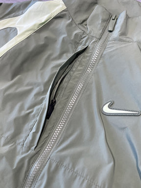 CORTA VENTO NIKE x NOCTA TRACK