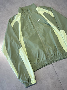 CORTA VENTO NIKE x NOCTA TRACK